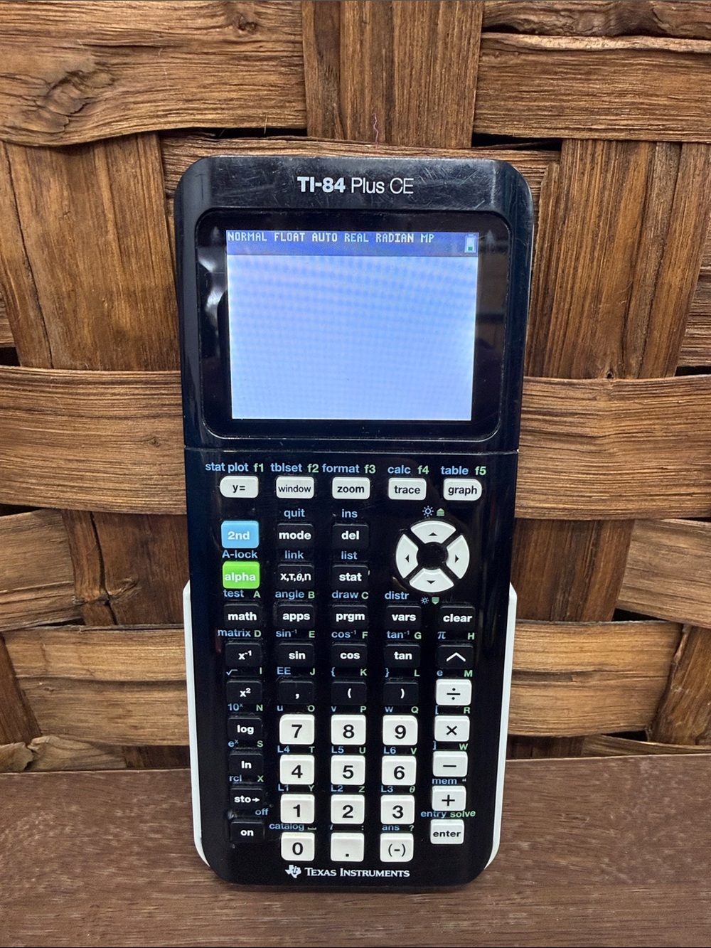 Texas Instruments TI-84 Plus CE Graphing Calculator in Black and White